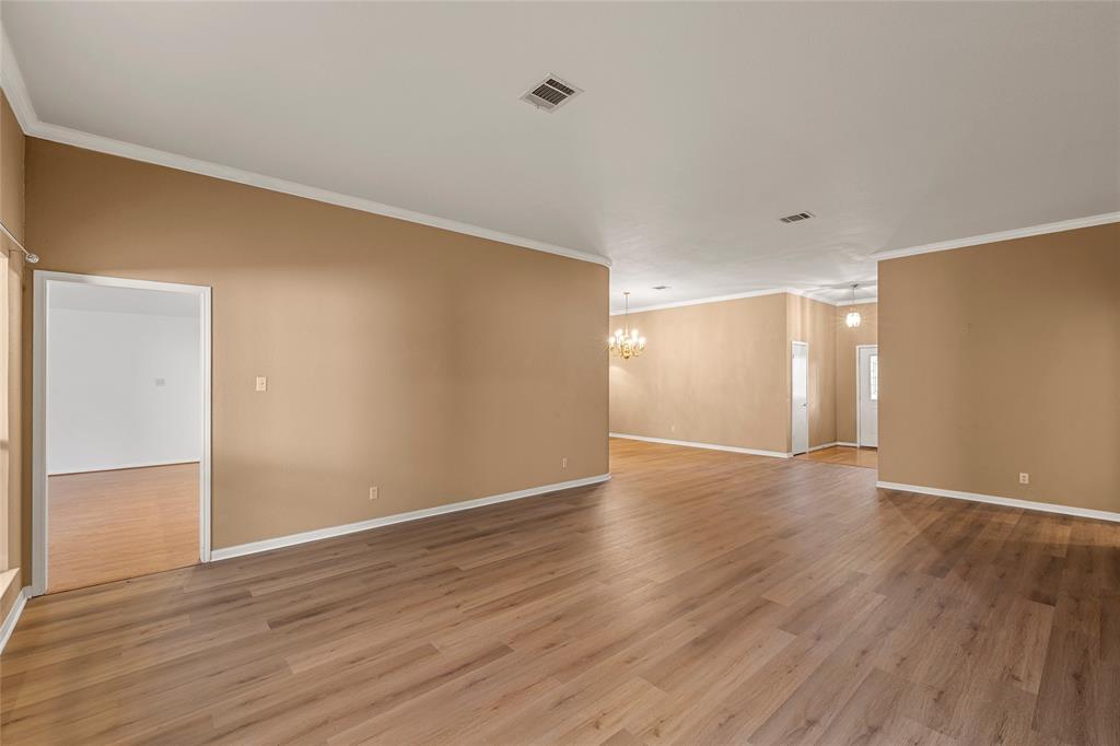 3133 Chimney Hill Drive Waco, TX 76708 - Photo 18 of 29 a view of an empty room with wooden floor and closet