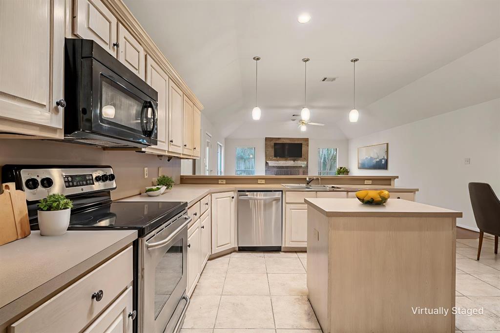 3133 Chimney Hill Drive Waco, TX 76708 - Photo 23 of 29 a kitchen with stainless steel appliances a stove sink and cabinets