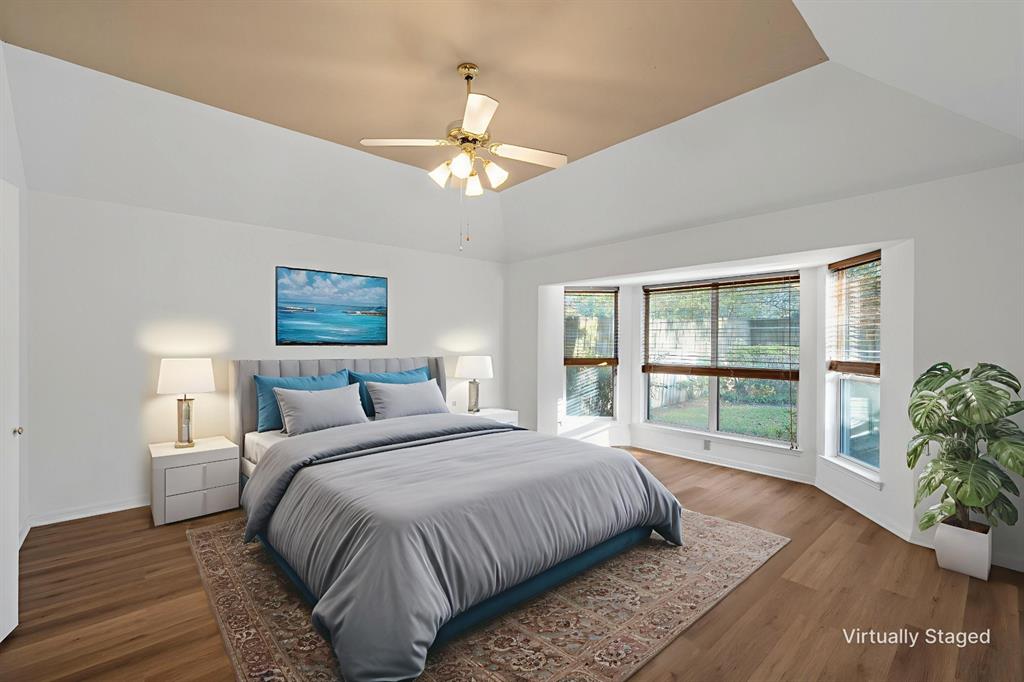 3133 Chimney Hill Drive Waco, TX 76708 - Photo 10 of 29 a spacious bedroom with a large bed and a large window