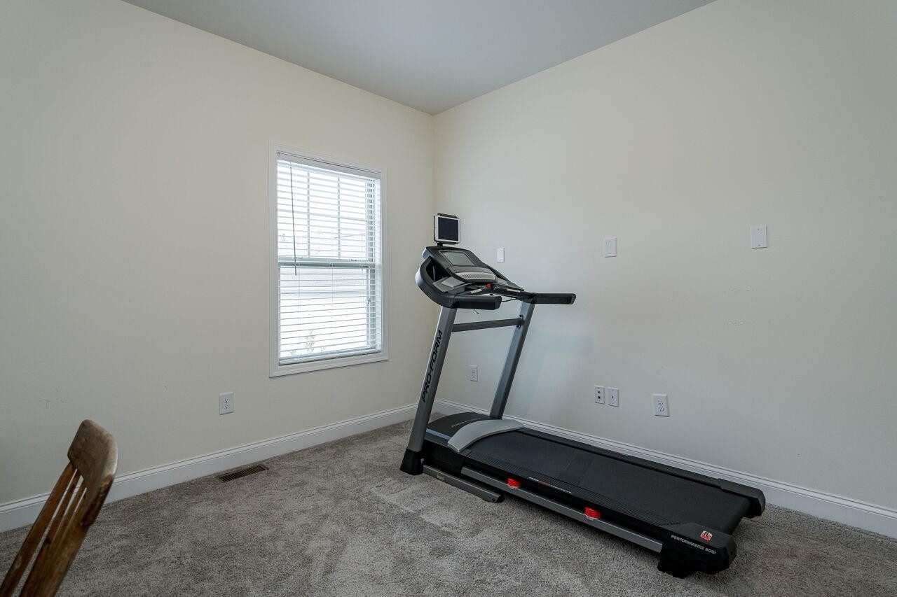 1517 Fullerton Place Raleigh, NC 27607 - Photo 25 of 30 Secondary bedroom upstairs---perfect for bedroom, home gym or home office. Secondary Bedroom