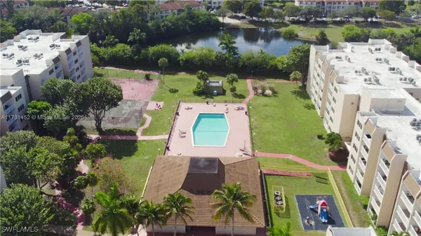 an aerial view of a house with outdoor space