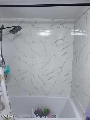 a bathroom with a bathtub