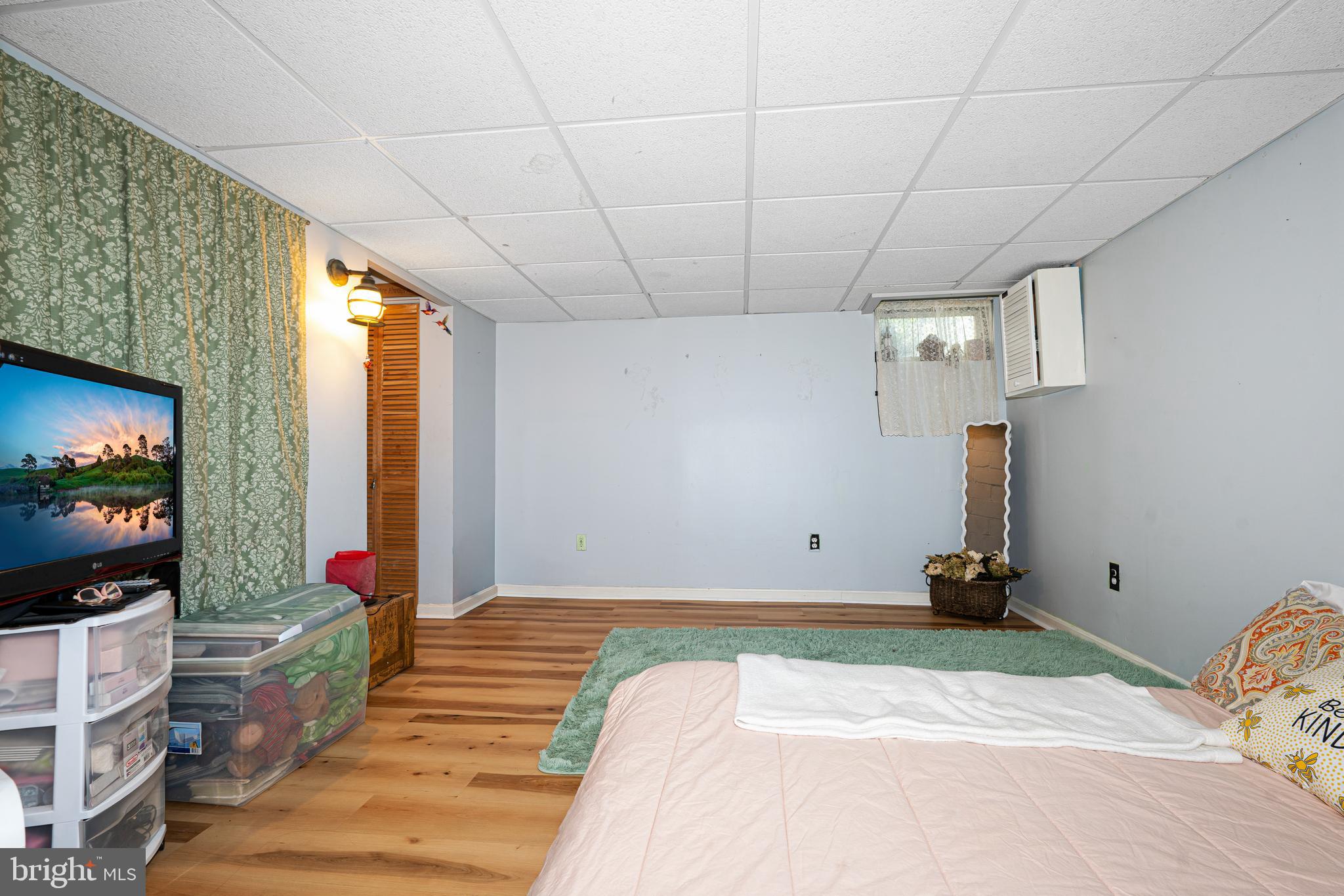 3454 McShane Way Baltimore, MD 21222 - Photo 19 of 35 a view of a room with window and couch