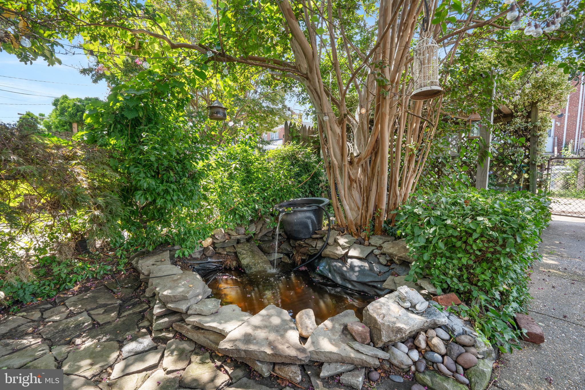 3454 McShane Way Baltimore, MD 21222 - Photo 23 of 35 a backyard of a house with lots of green space