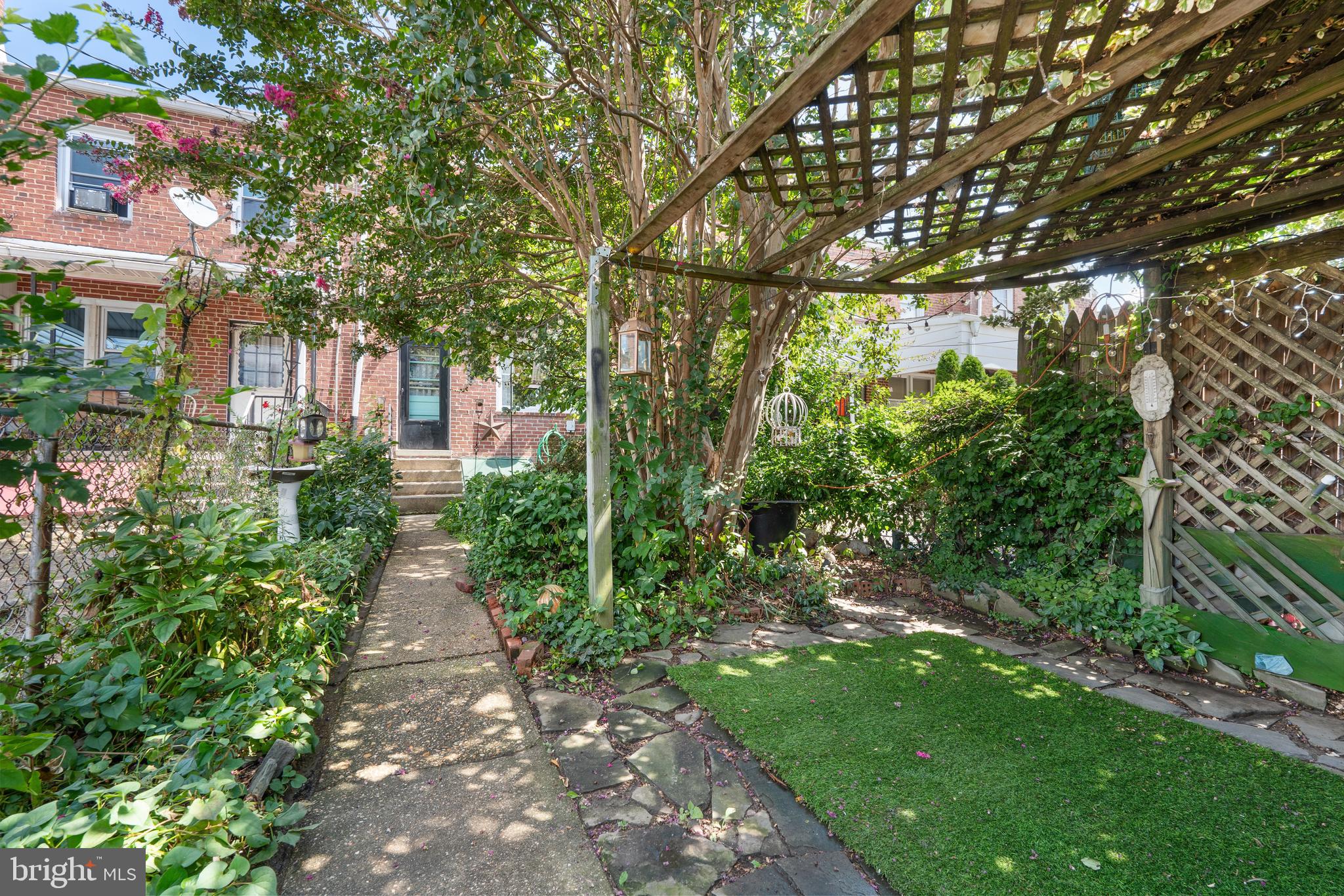 3454 McShane Way Baltimore, MD 21222 - Photo 26 of 35 a view of a pathway both side of the house