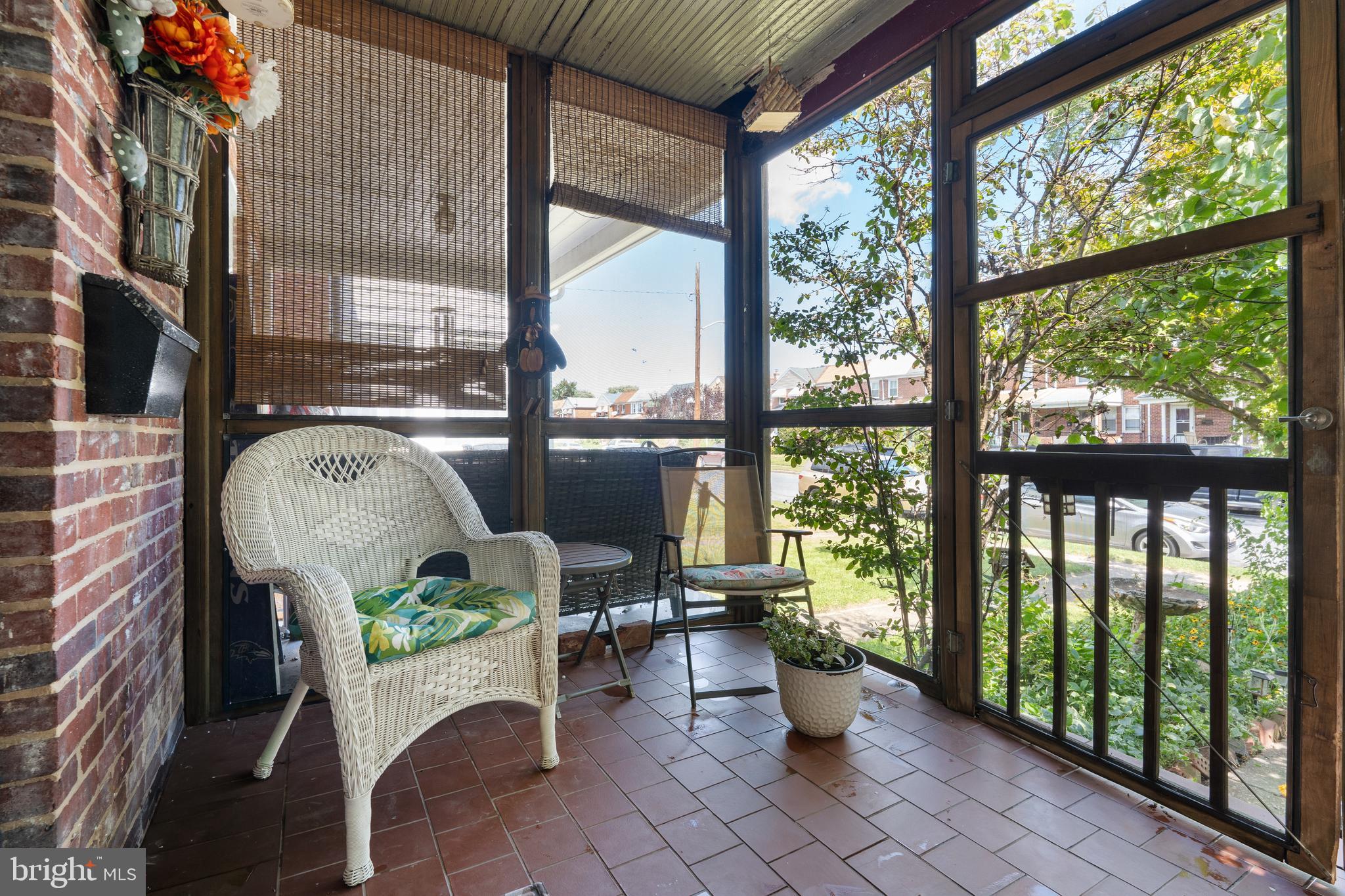 3454 McShane Way Baltimore, MD 21222 - Photo 29 of 35 a living room filled with furniture and a floor to ceiling window