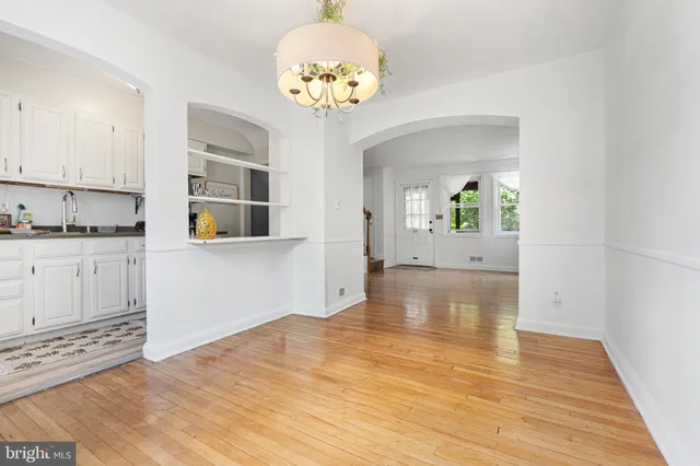 a view of a living room and dining room