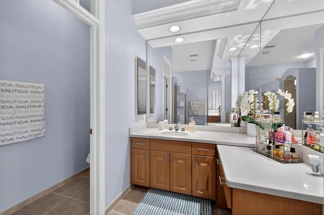 a dining room with furniture a window and stainless steel appliances