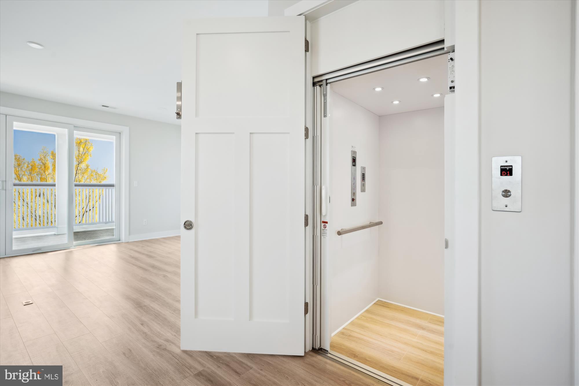 37926 Even Tide Lane Rehoboth Beach, DE 19971 - Photo 12 of 18 a view of a hallway with wooden floor and staircase
