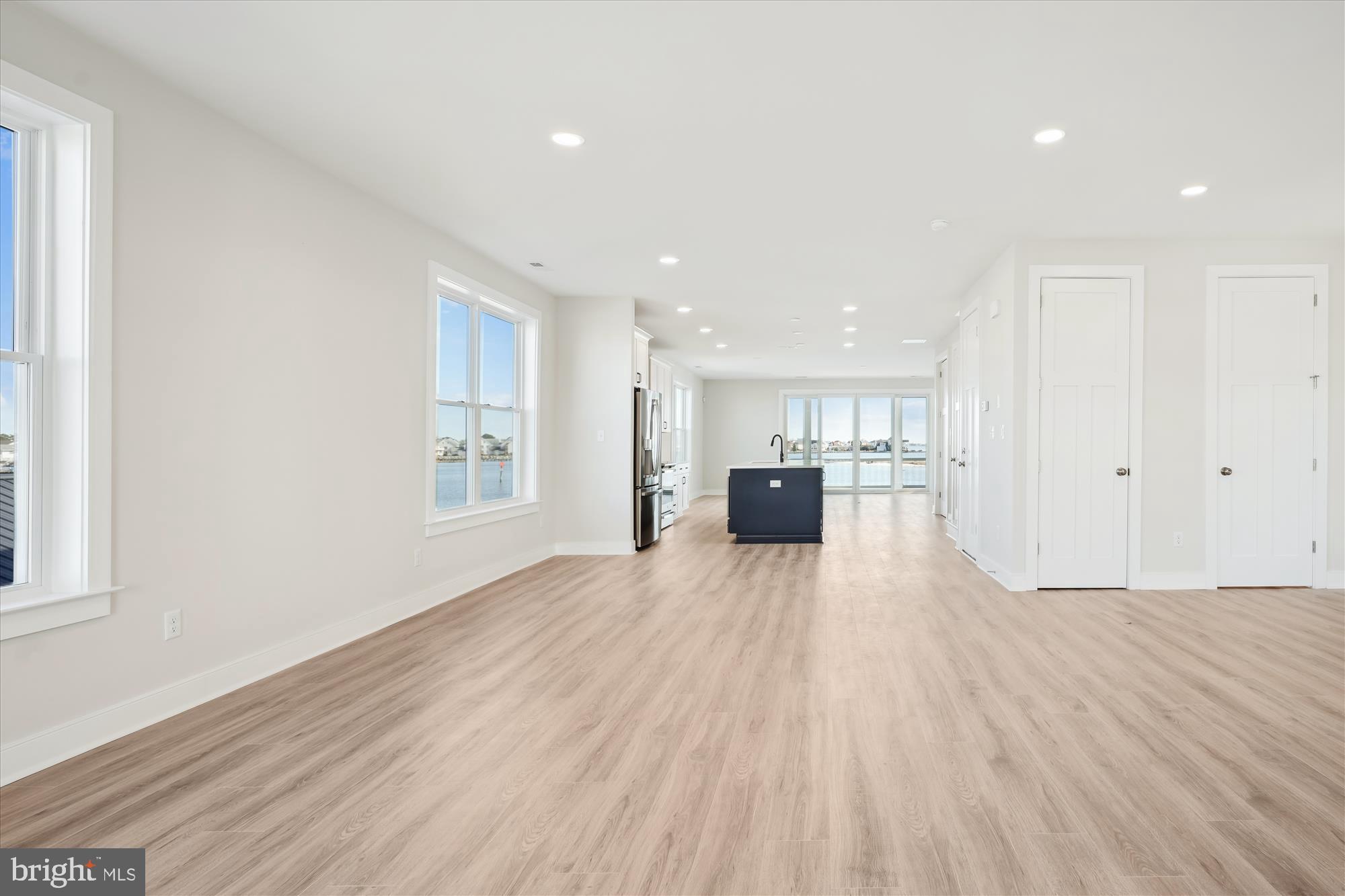 37926 Even Tide Lane Rehoboth Beach, DE 19971 - Photo 10 of 18 a view of kitchen with furniture and wooden floor
