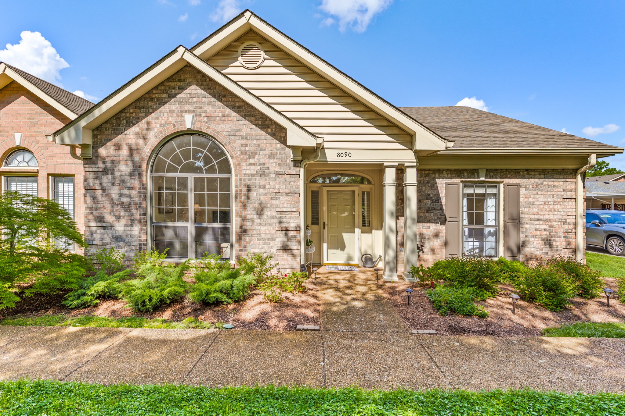 8090 Sunrise Circle Franklin, TN 37067 - Photo 1 of 57 a front view of a house with a yard