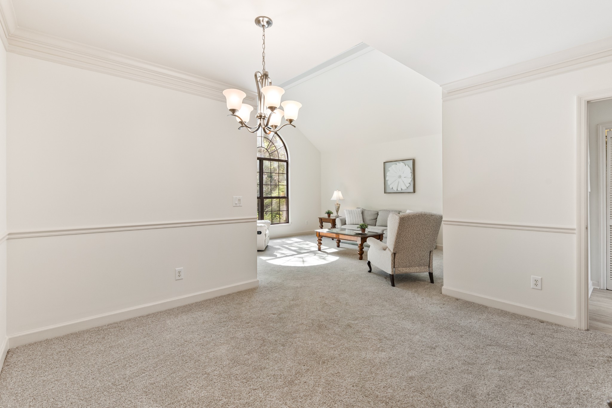 8090 Sunrise Circle Franklin, TN 37067 - Photo 14 of 57 a view of a livingroom with a couch and chandelier