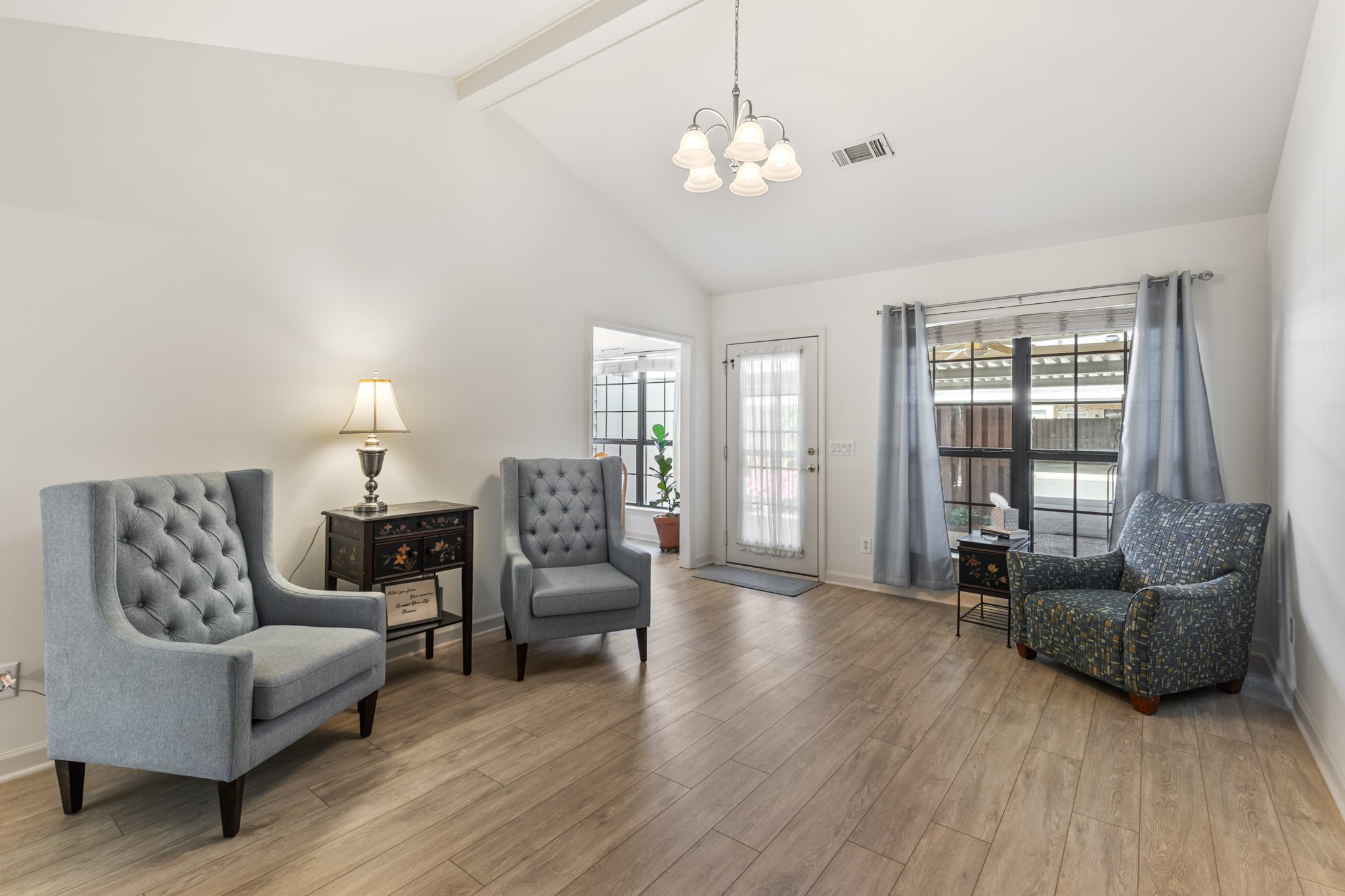 8090 Sunrise Circle Franklin, TN 37067 - Photo 19 of 57 a living room with furniture and a large window