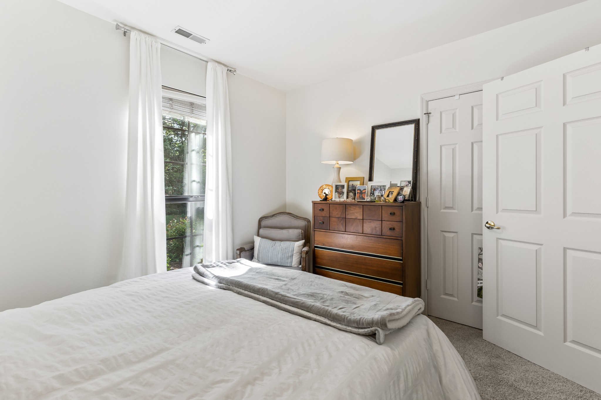 8090 Sunrise Circle Franklin, TN 37067 - Photo 35 of 57 a bedroom with a bed and a dresser