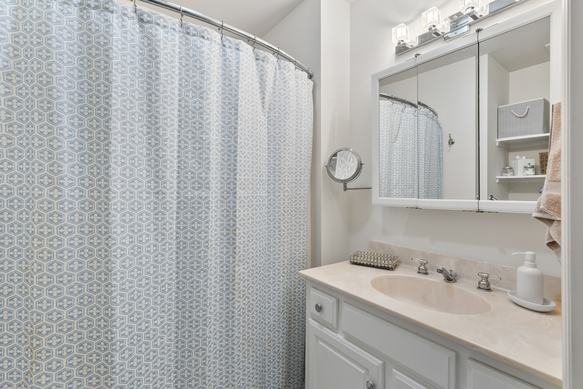 8090 Sunrise Circle Franklin, TN 37067 - Photo 37 of 57 a bathroom with a sink and a mirror