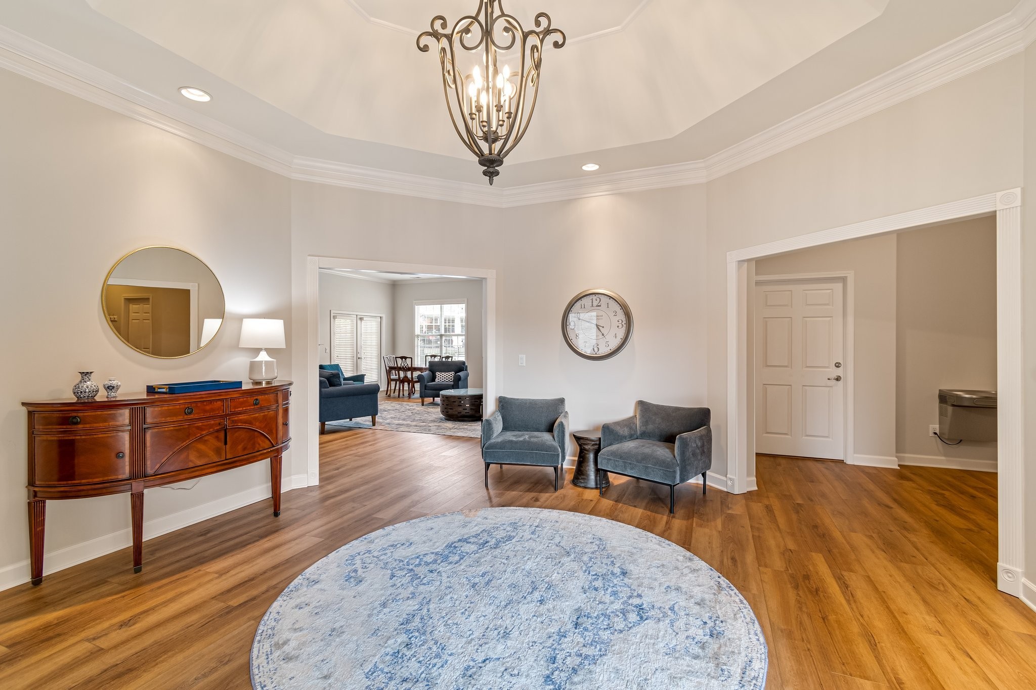 8090 Sunrise Circle Franklin, TN 37067 - Photo 53 of 57 a living room with furniture a mirror and a window