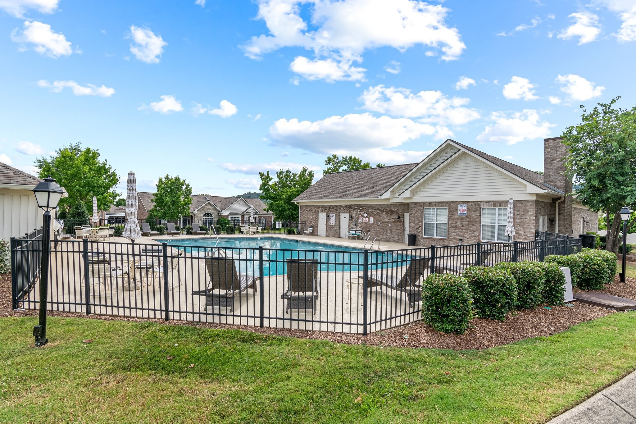 8090 Sunrise Circle Franklin, TN 37067 - Photo 56 of 57 a front view of a house with a garden