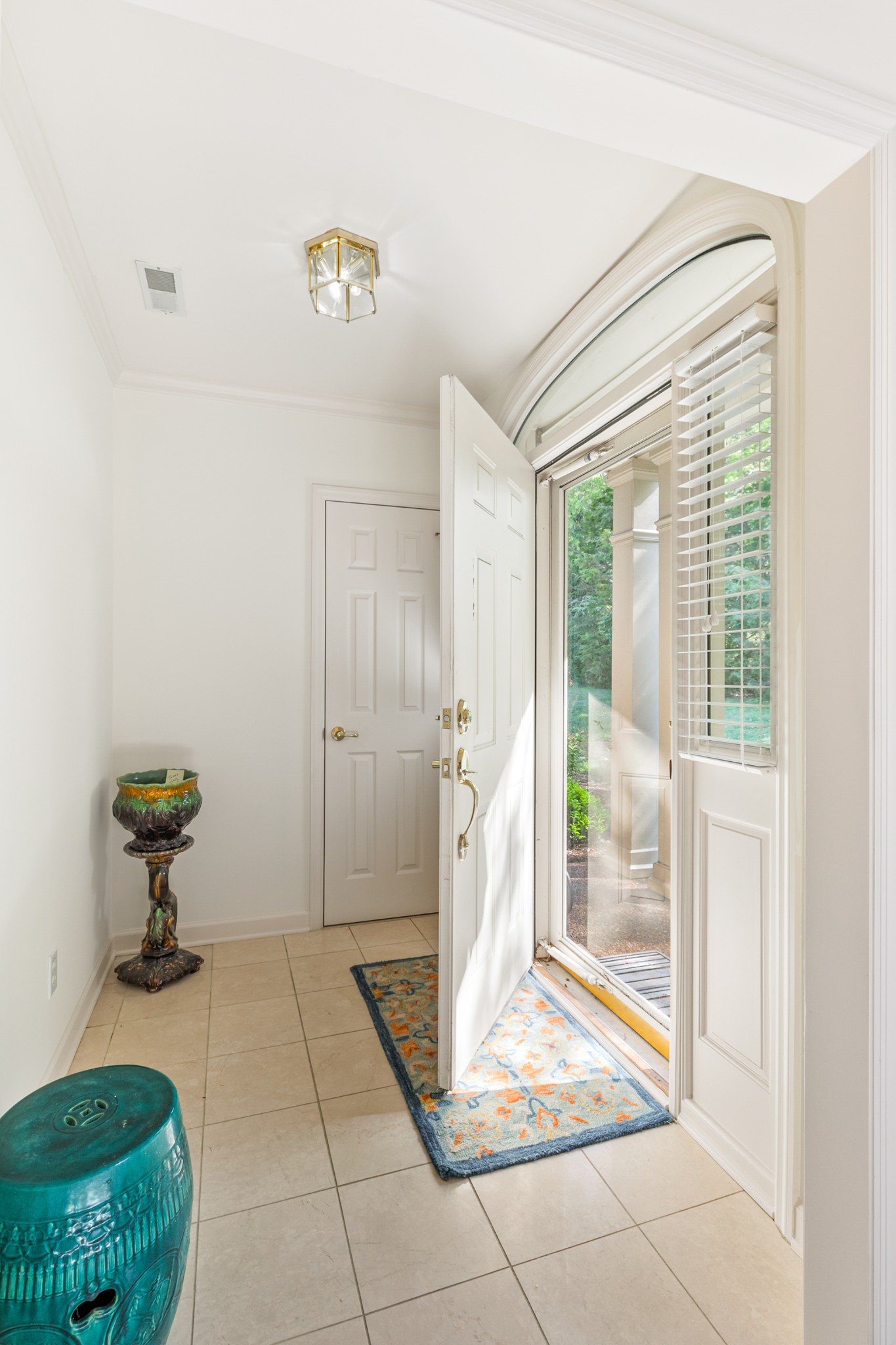 8090 Sunrise Circle Franklin, TN 37067 - Photo 7 of 57 a view of an entryway of the house