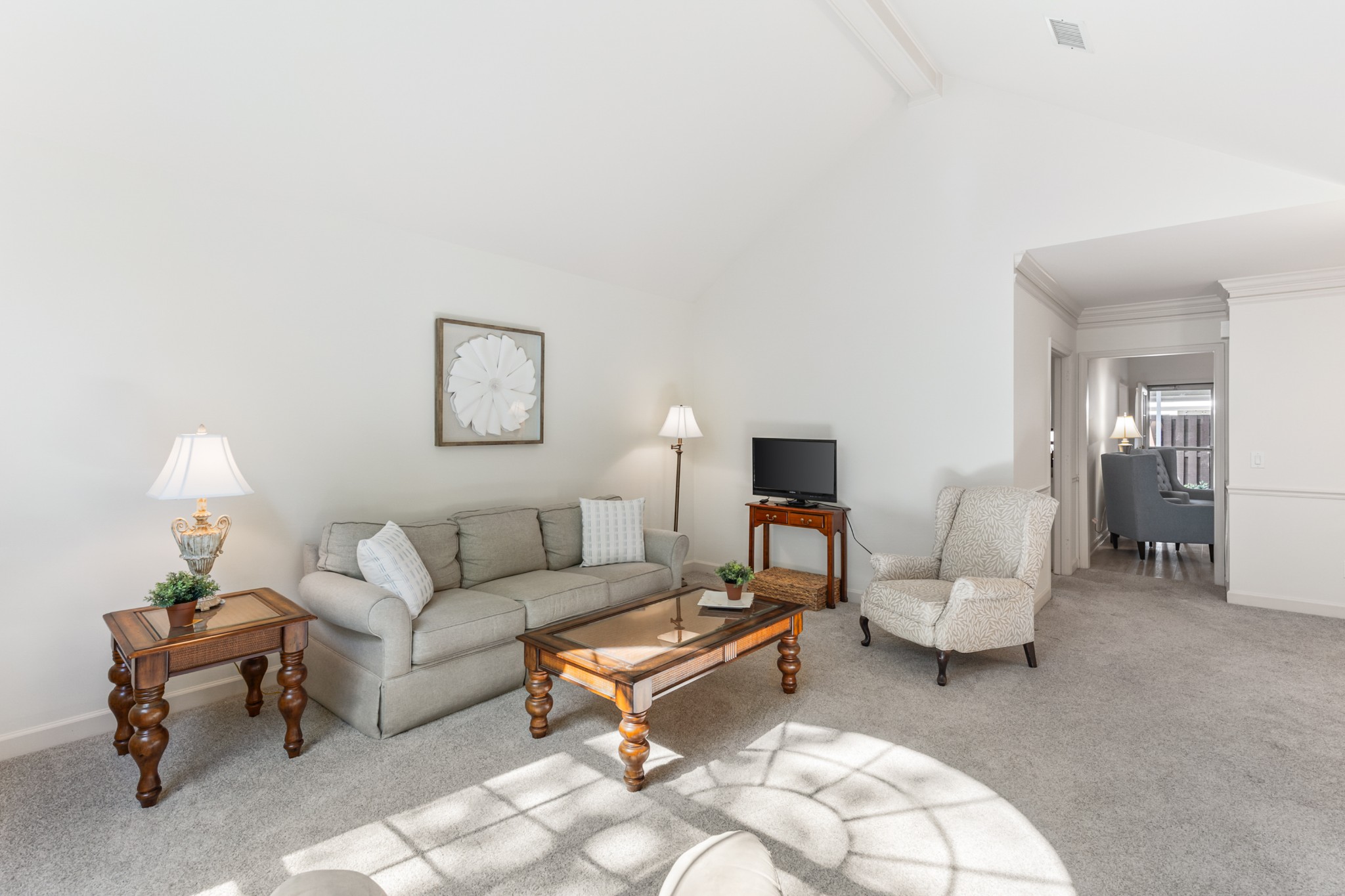 8090 Sunrise Circle Franklin, TN 37067 - Photo 8 of 57 a living room with furniture a lamp and a lamp