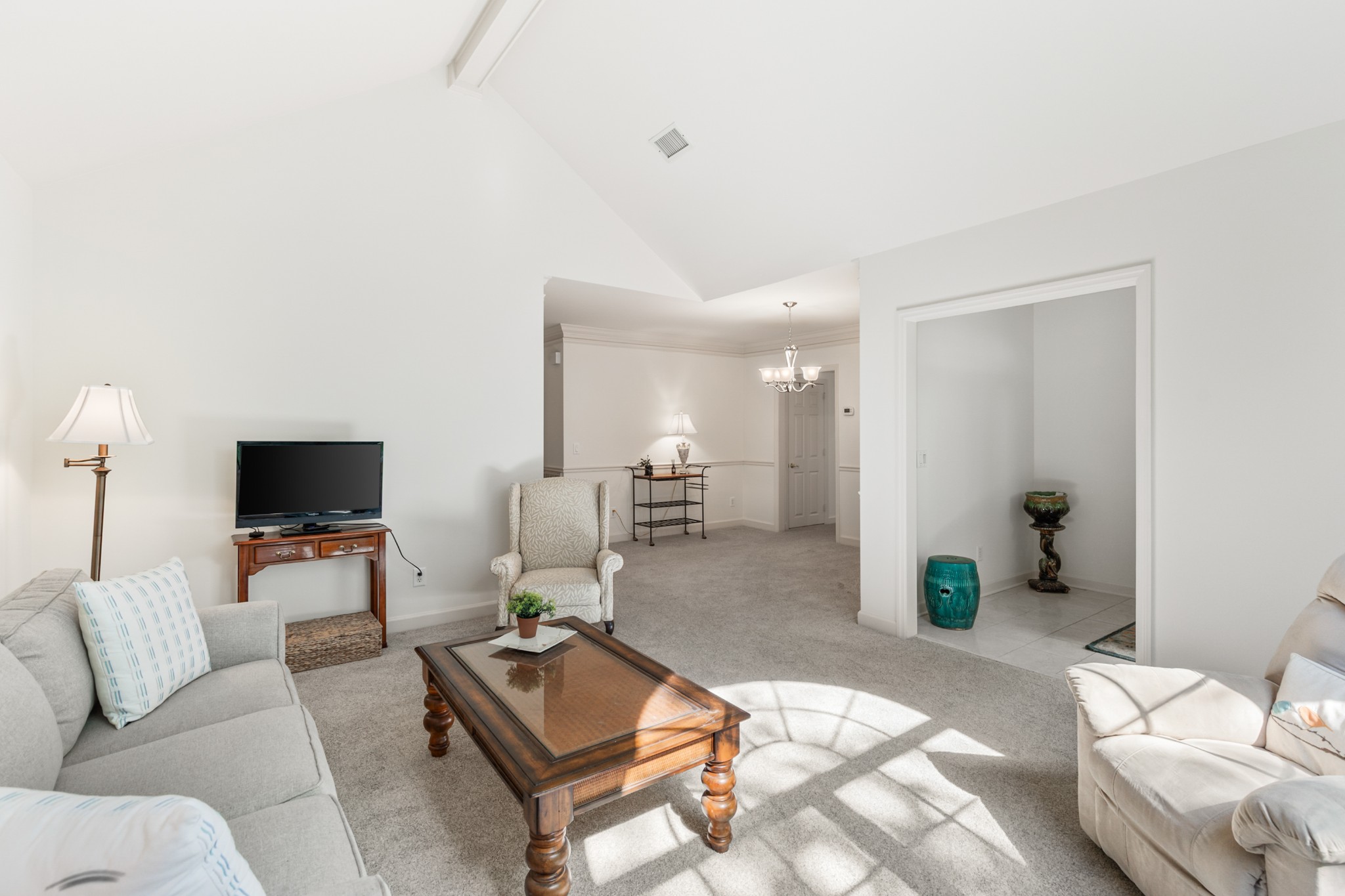 8090 Sunrise Circle Franklin, TN 37067 - Photo 9 of 57 a living room with furniture and a flat screen tv