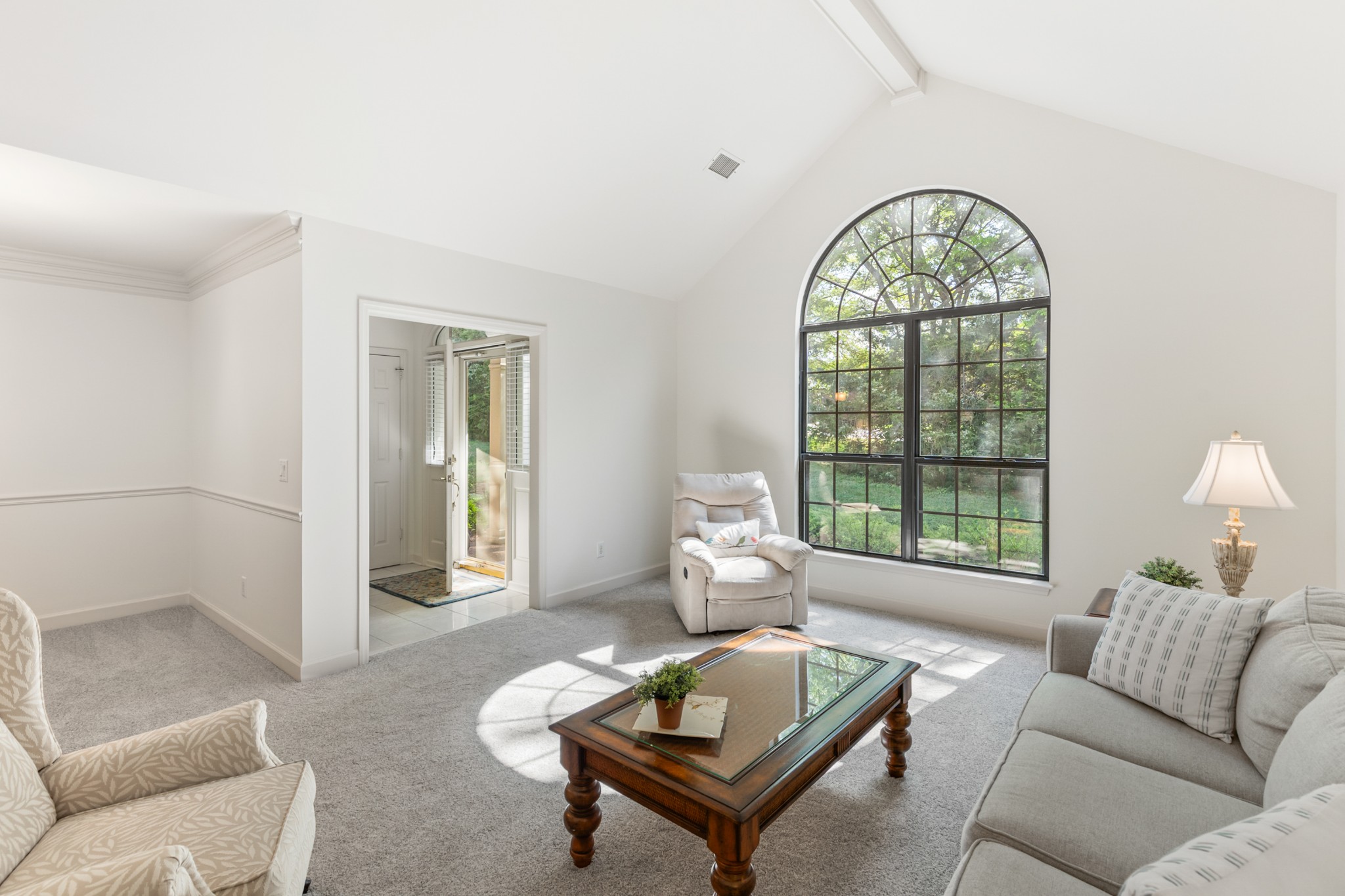 8090 Sunrise Circle Franklin, TN 37067 - Photo 10 of 57 a living room with furniture and a large window