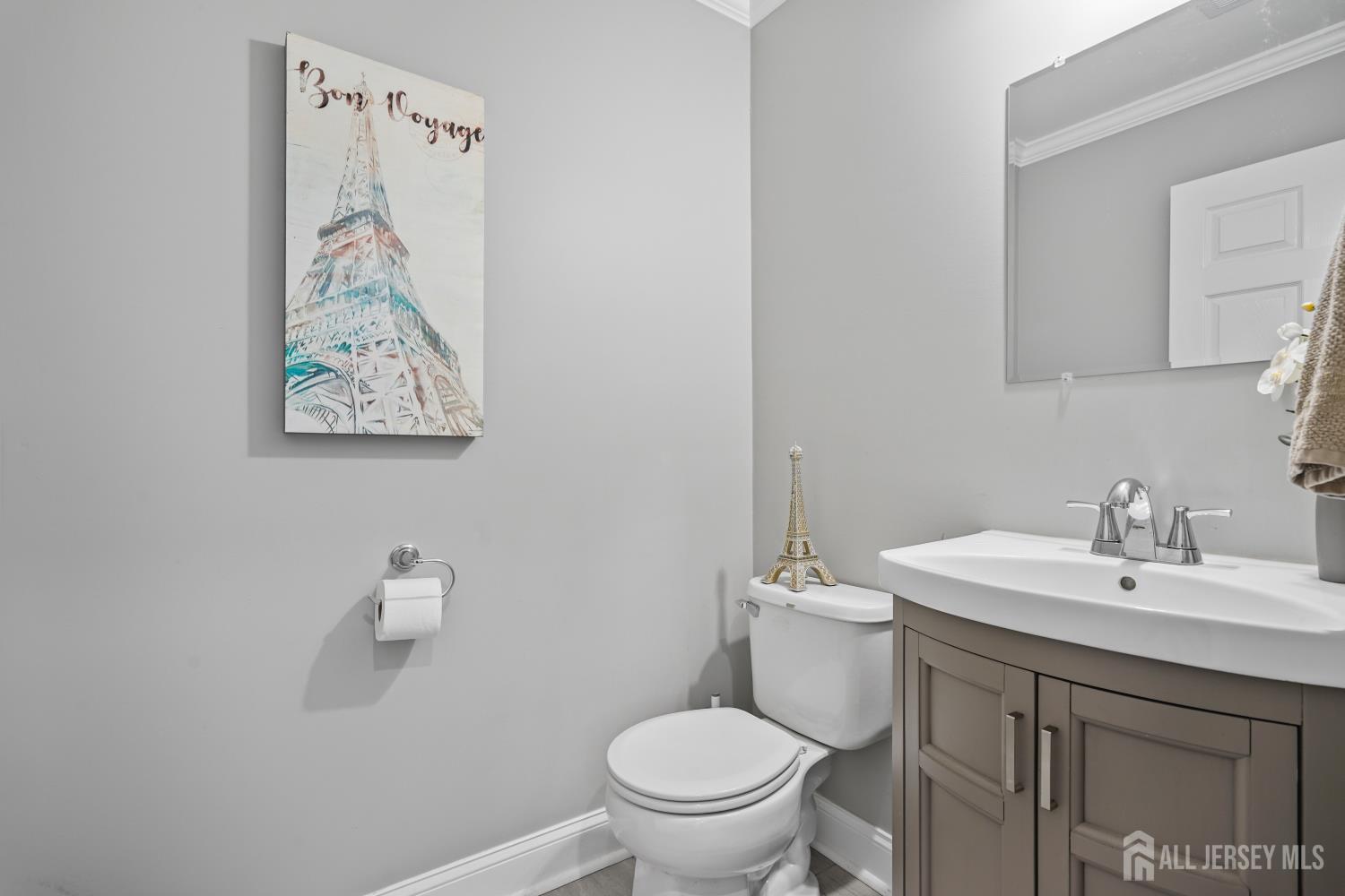 157 Setter Place Freehold, NJ 07728 - Photo 8 of 21 a bathroom with a sink mirror and toilet