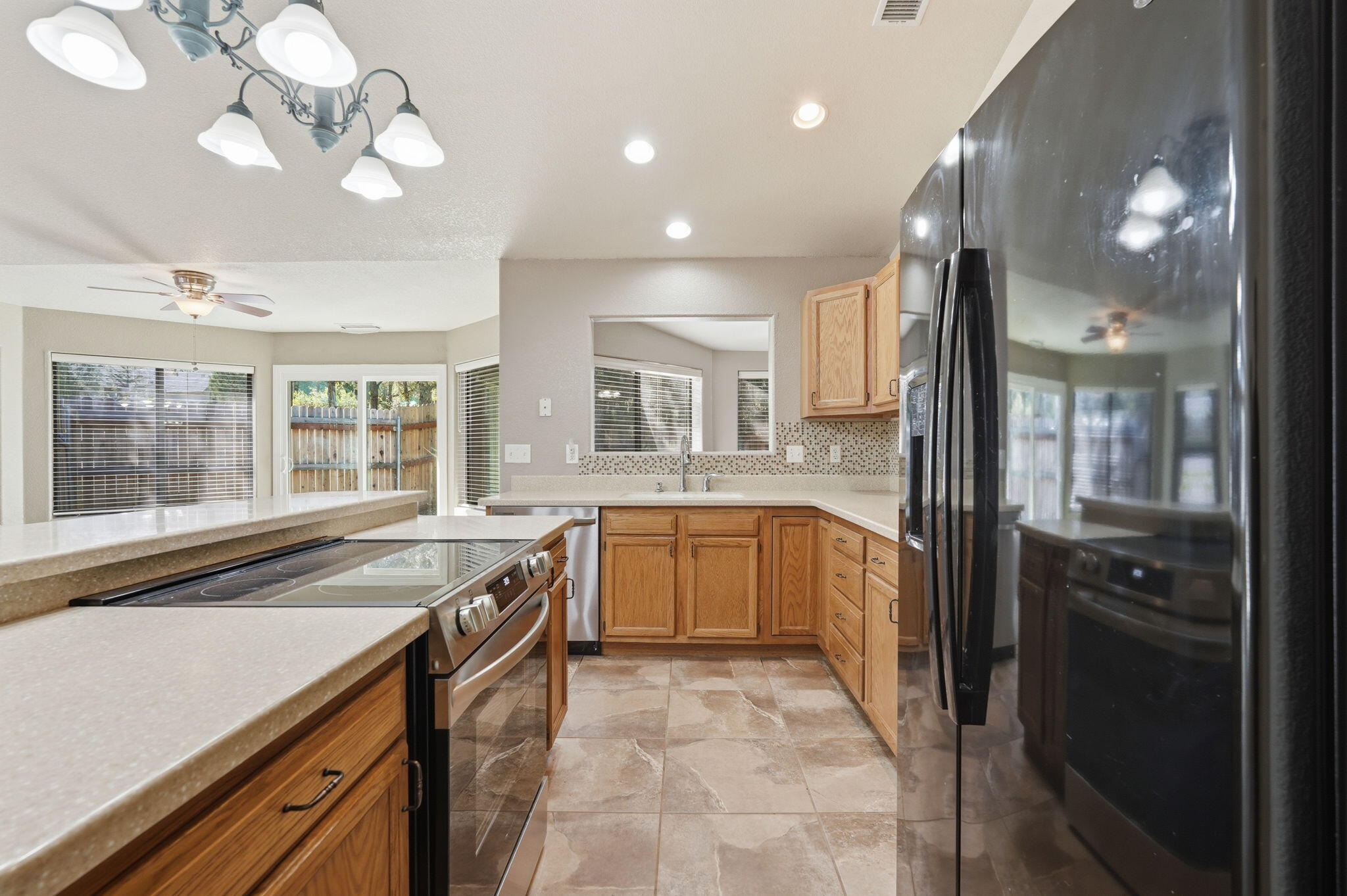 310 North Trailwood Road Payson, AZ 85541 - Photo 18 of 55 a large kitchen with stainless steel appliances granite countertop a sink and cabinets