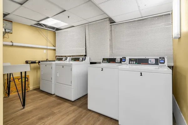 a utility room with washer and dryer