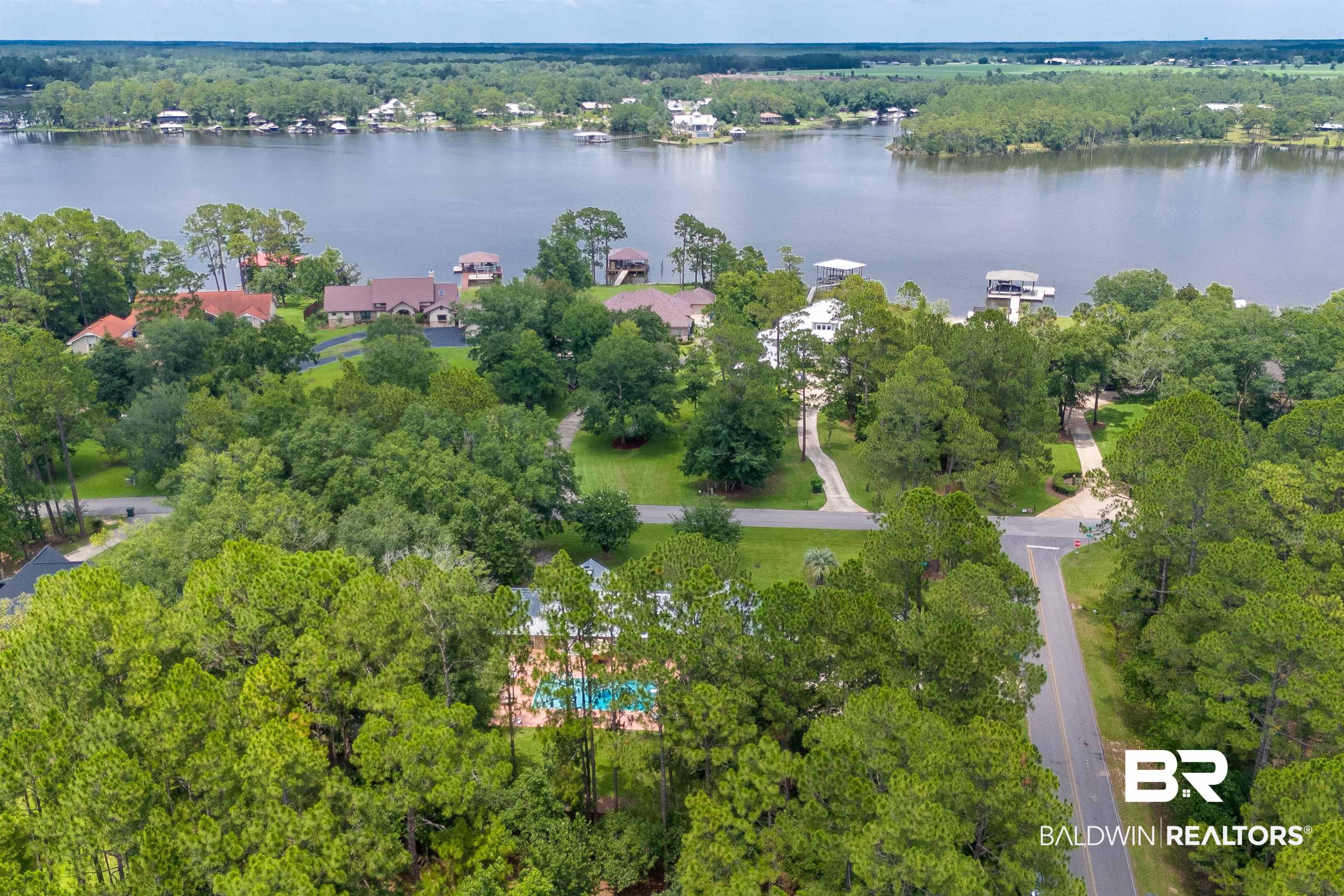 24551 Wolf Bay Drive Foley, AL 36535 - Photo 52 of 59 Aerial view of property and surrounding area featuring a large body of water
