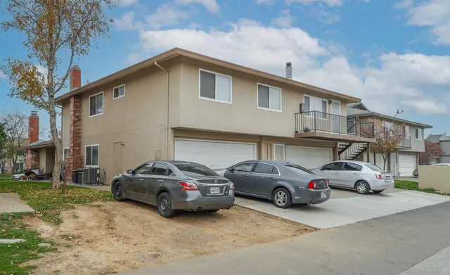a car parked in front of a house