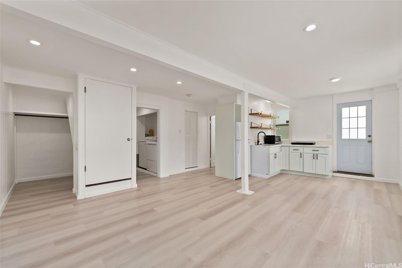2811 Henry Street Honolulu, HI 96817 - Photo 15 of 25 Thoughtful details like under-stair storage and an open layout maximize every square inch of this wonderful lower level.