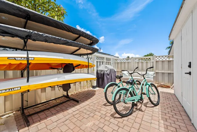 a living room with furniture potted plant and a window