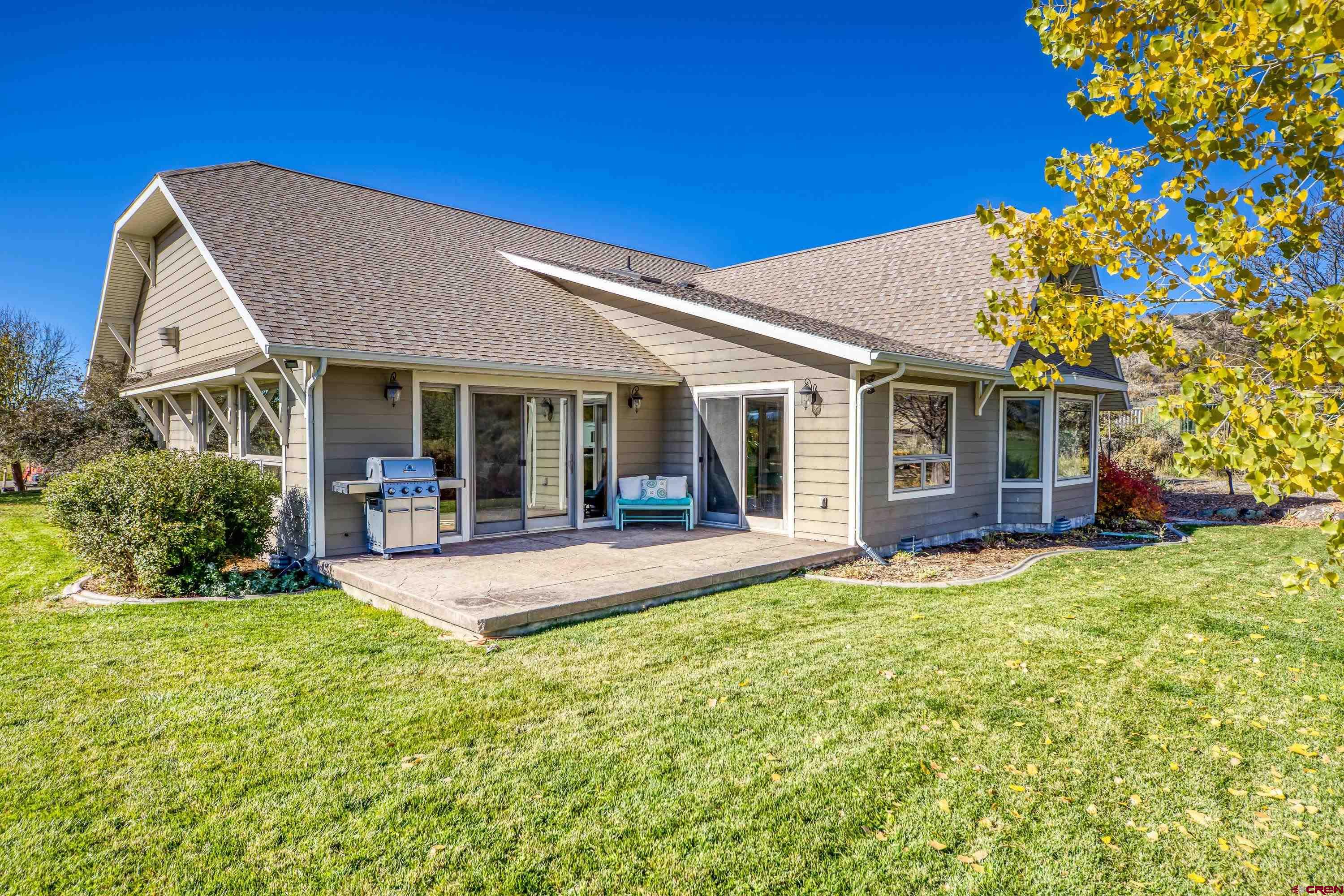 36639 M50 Road Hotchkiss, CO 81419 - Photo 14 of 45 a view of a house with sitting area and garden