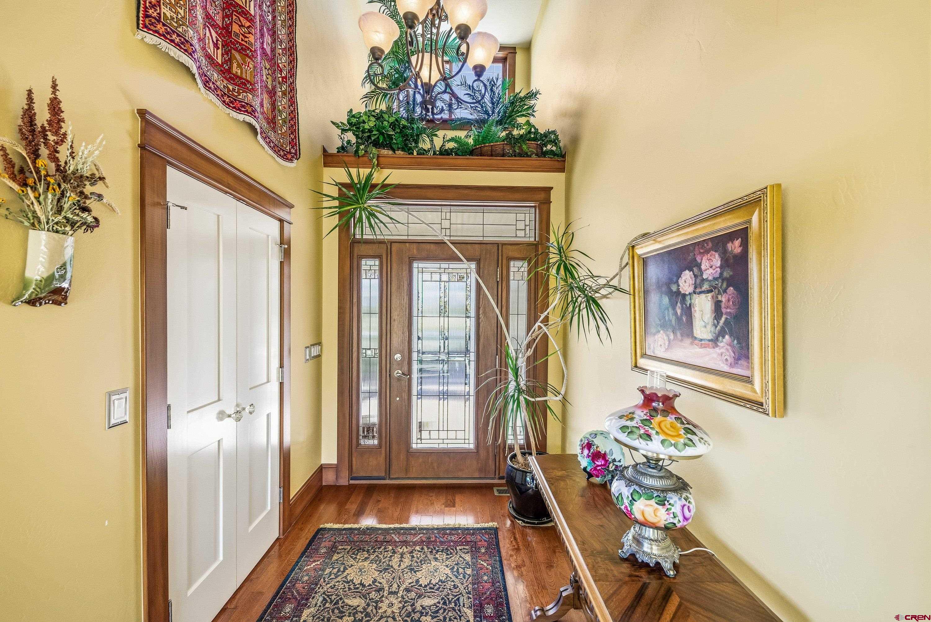 36639 M50 Road Hotchkiss, CO 81419 - Photo 15 of 45 a hallway with beautiful frames and paintings on the wall