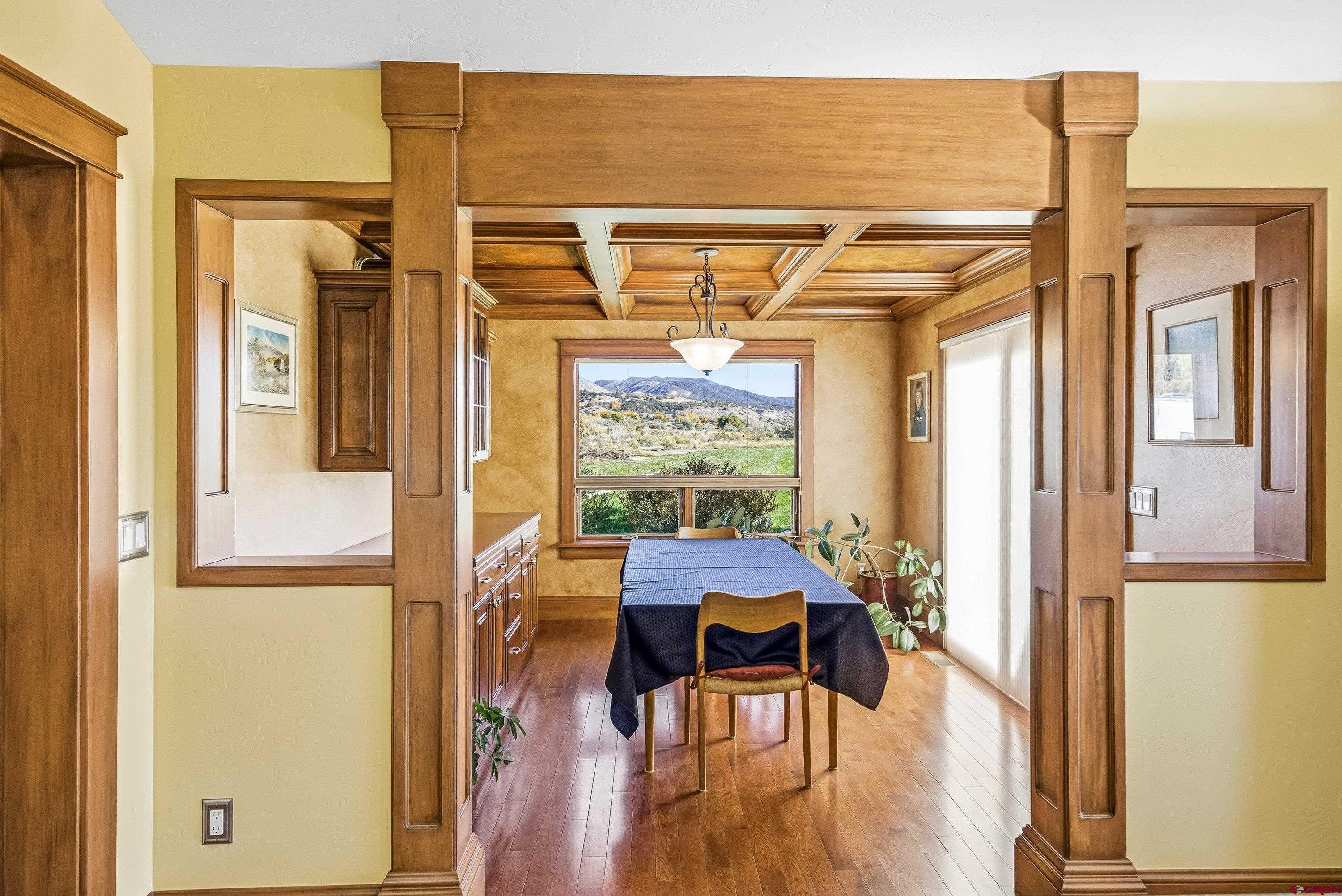 36639 M50 Road Hotchkiss, CO 81419 - Photo 25 of 45 a view of a dining room with furniture window and wooden floor