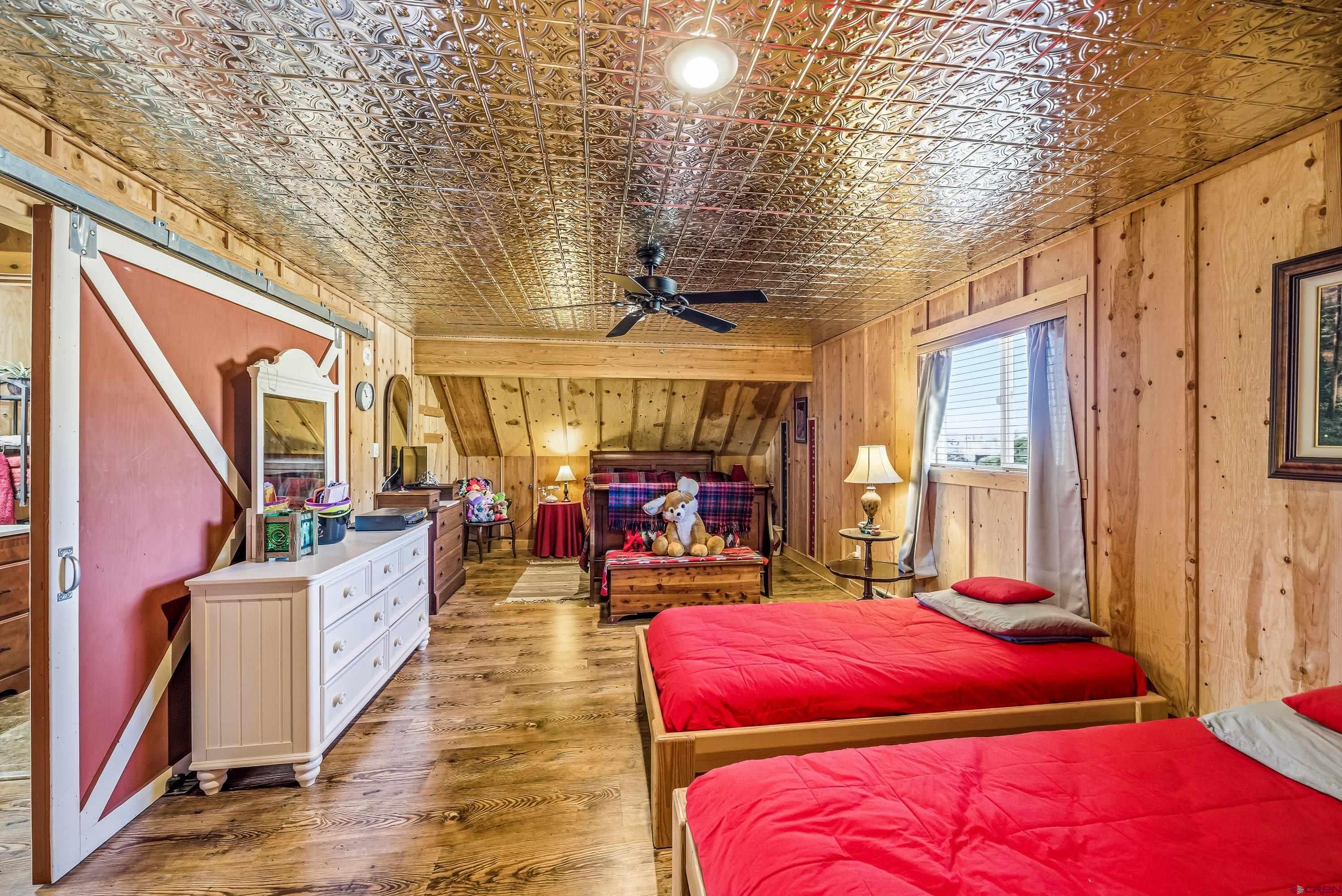 36639 M50 Road Hotchkiss, CO 81419 - Photo 44 of 45 a bed room with a bed and a balcony
