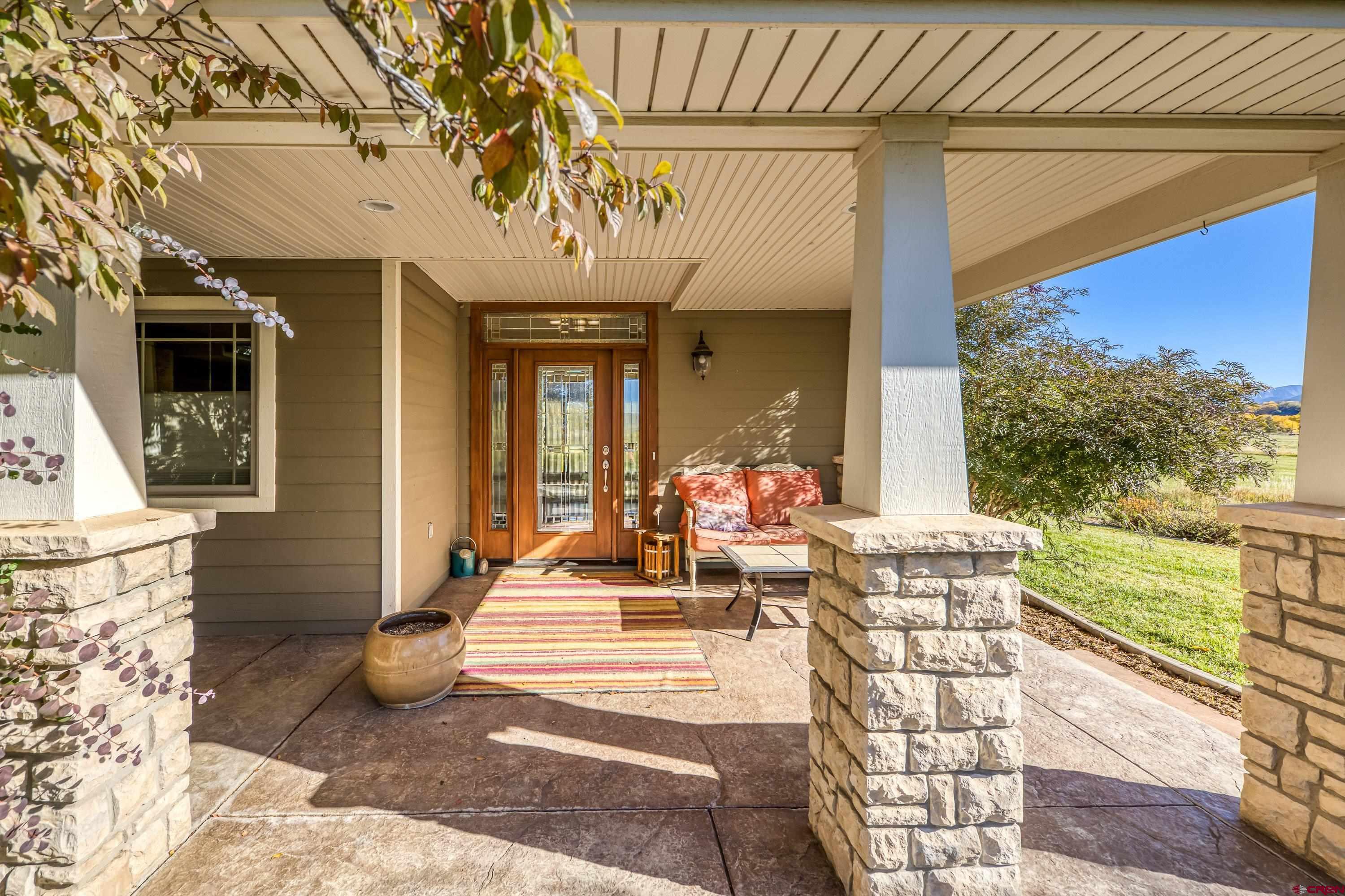 36639 M50 Road Hotchkiss, CO 81419 - Photo 10 of 45 a view of a patio with couches table and chairs