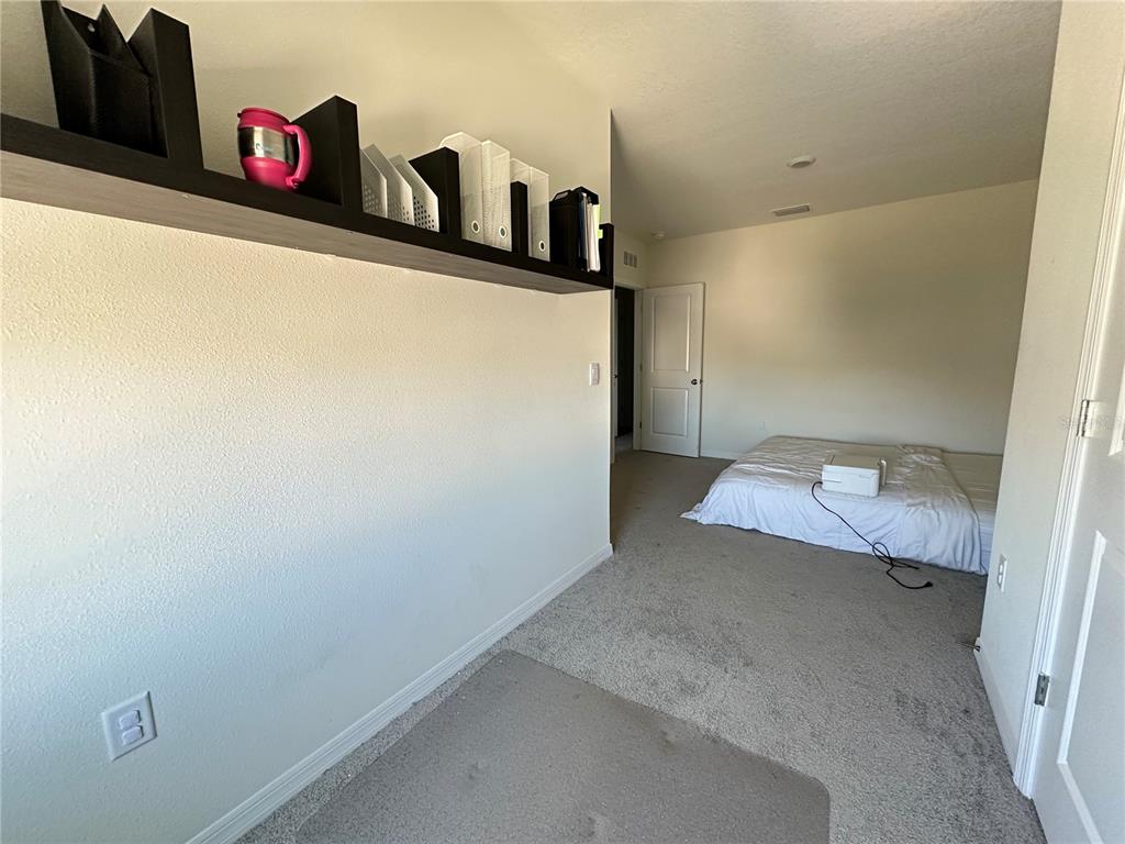 16641 Grotto Steam Place Wimauma, FL 33598 - Photo 16 of 17 a view of cupboard