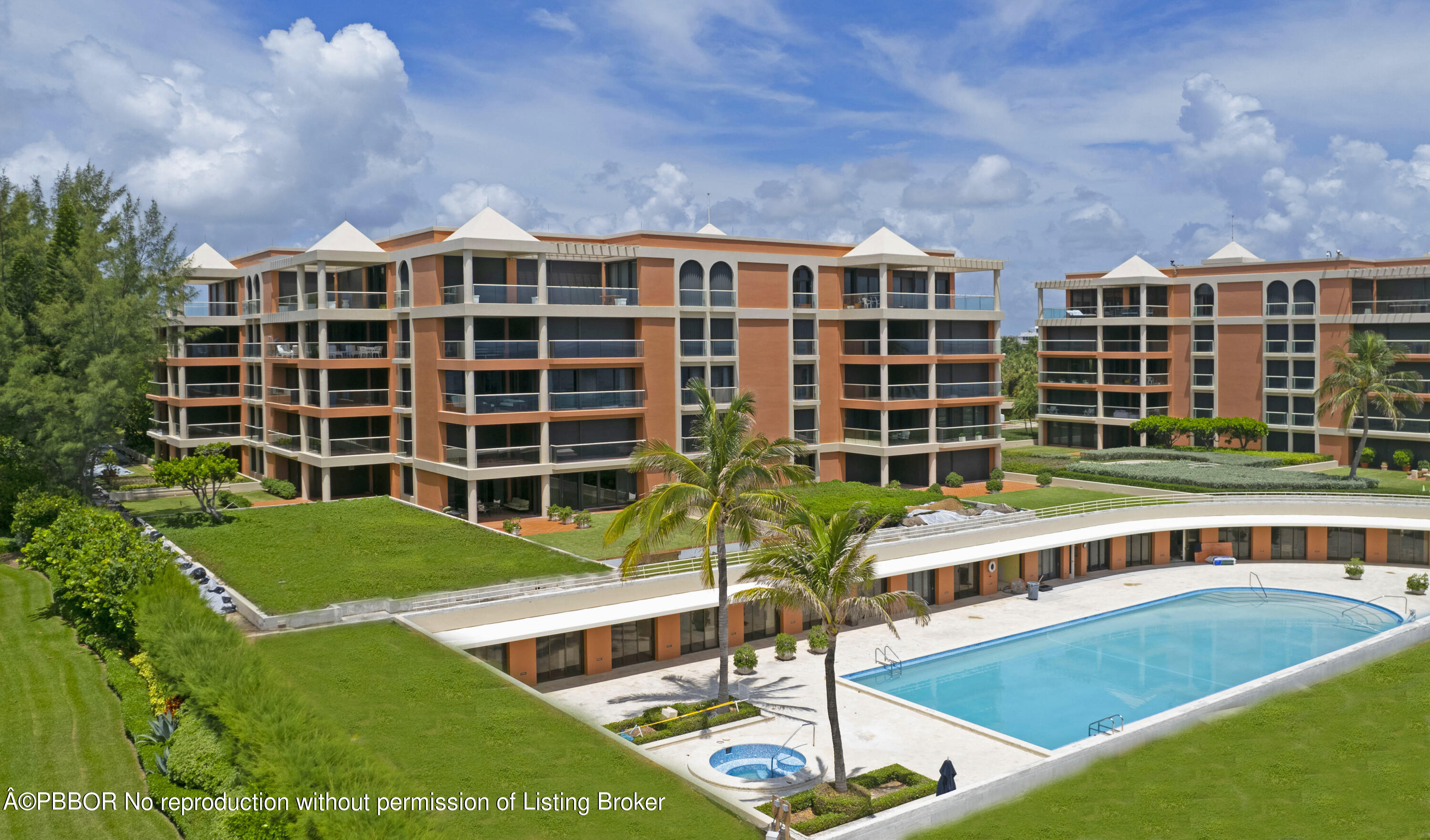2 North Breakers Row, Unit S43 Palm Beach, FL 33480 - Photo 16 of 37 a view of a building with a swimming pool and sitting area