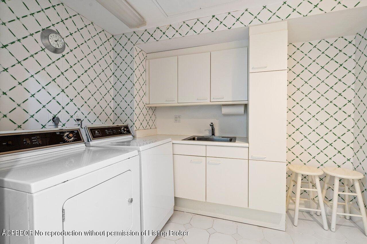 2 North Breakers Row, Unit S43 Palm Beach, FL 33480 - Photo 26 of 37 a kitchen with a sink cabinets and appliances