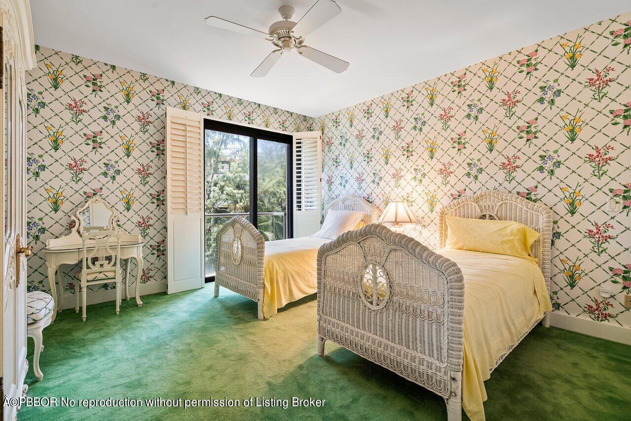 2 North Breakers Row, Unit S43 Palm Beach, FL 33480 - Photo 31 of 37 a bedroom with a bed and a window