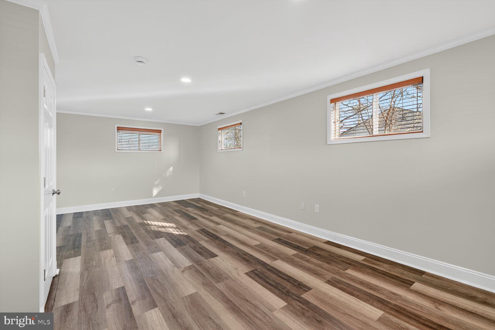 6307 Cottonwood Drive Alexandria, VA 22310 - Photo 22 of 28 a view of empty room with wooden floor