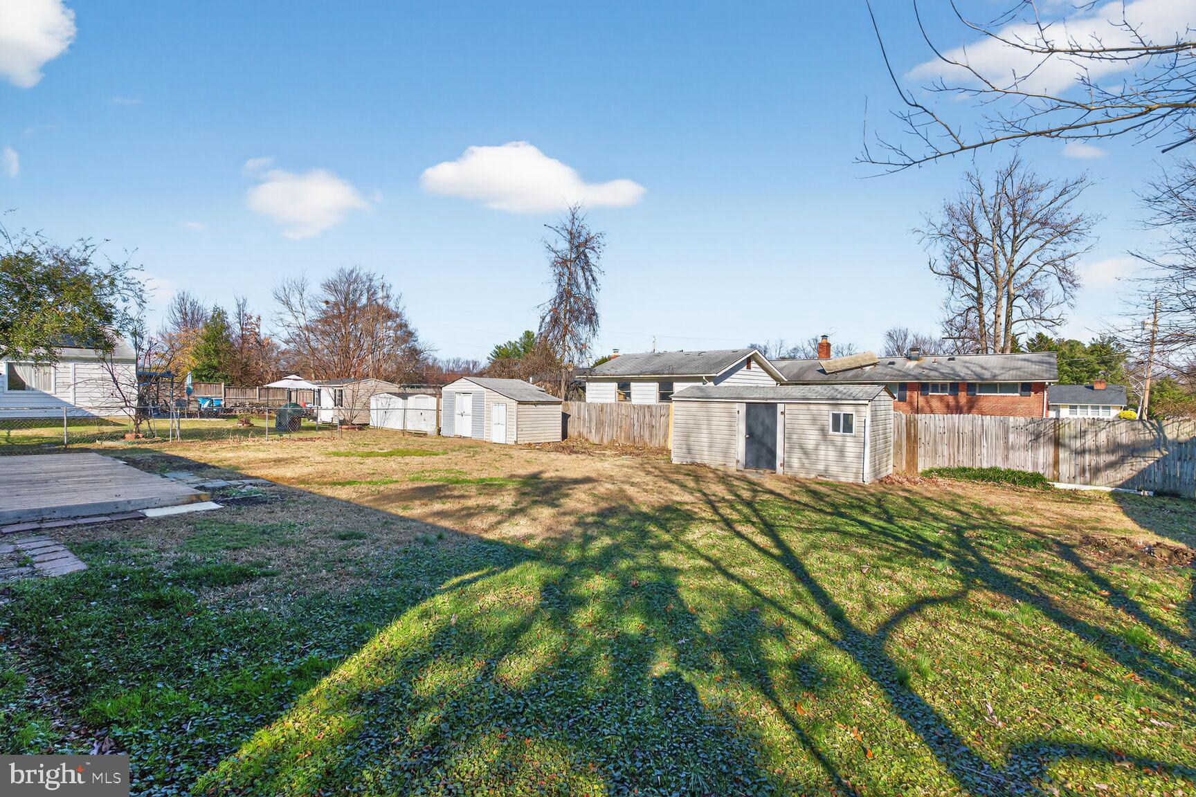6307 Cottonwood Drive Alexandria, VA 22310 - Photo 28 of 28 a view of a swimming pool with a patio and yard