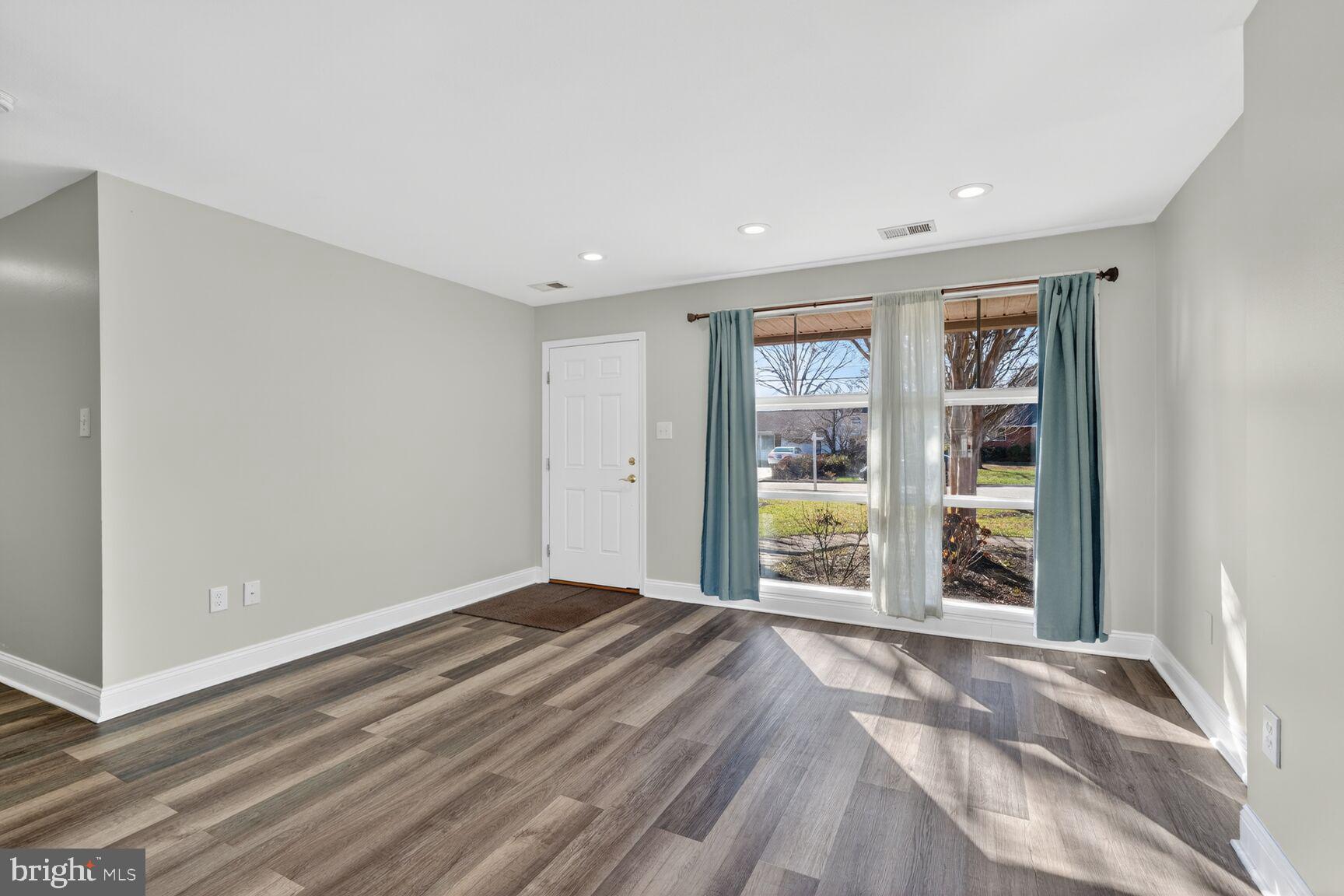 6307 Cottonwood Drive Alexandria, VA 22310 - Photo 5 of 28 a view of an empty room with a window