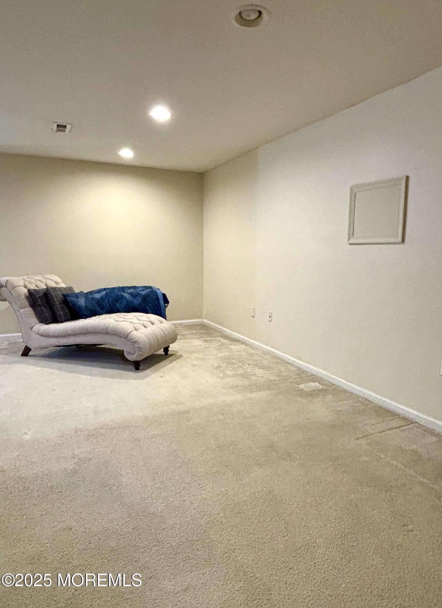 39 Rozalyn Lane, Unit 141 South Amboy, NJ 08879 - Photo 15 of 18 a living room with furniture and a couch