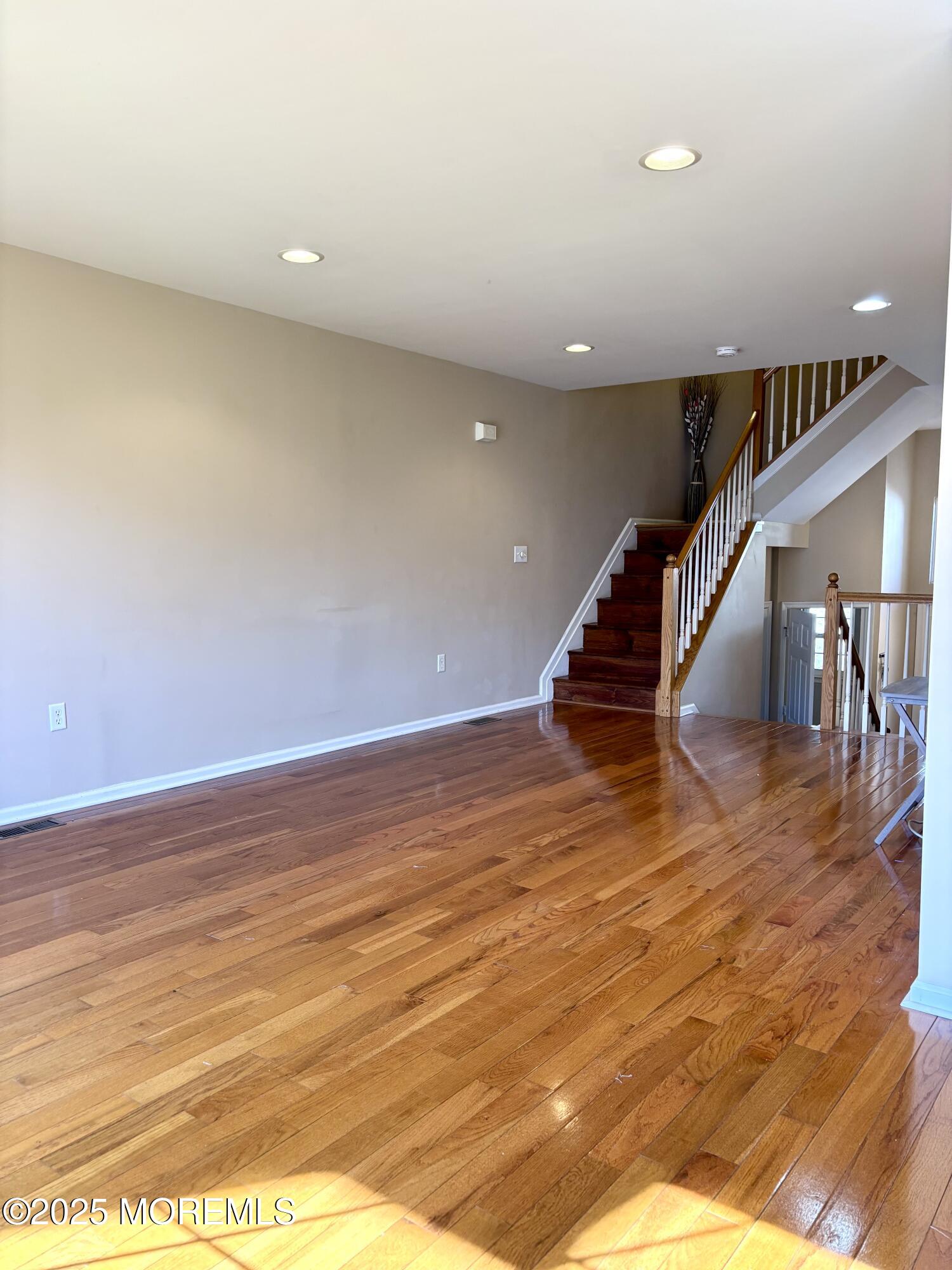 39 Rozalyn Lane, Unit 141 South Amboy, NJ 08879 - Photo 16 of 19 a view of entryway and hall with wooden floor