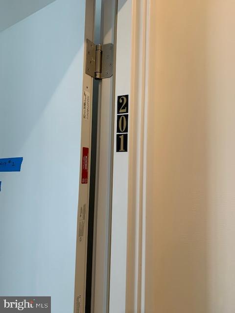 6162 Ridge Avenue, Unit 201 Philadelphia, PA 19128 - Photo 7 of 14 a view of hallway with stairs