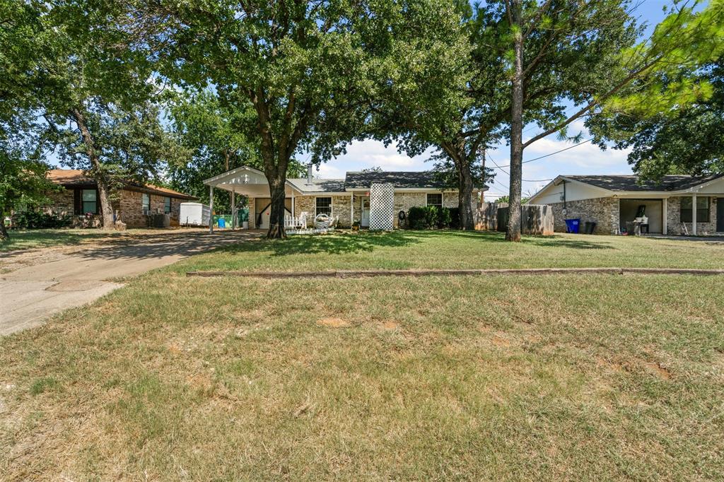 153 Rhoades Street Azle, TX 76020 - Photo 1 of 1 Welcome to your little paradise on 1/4 acre