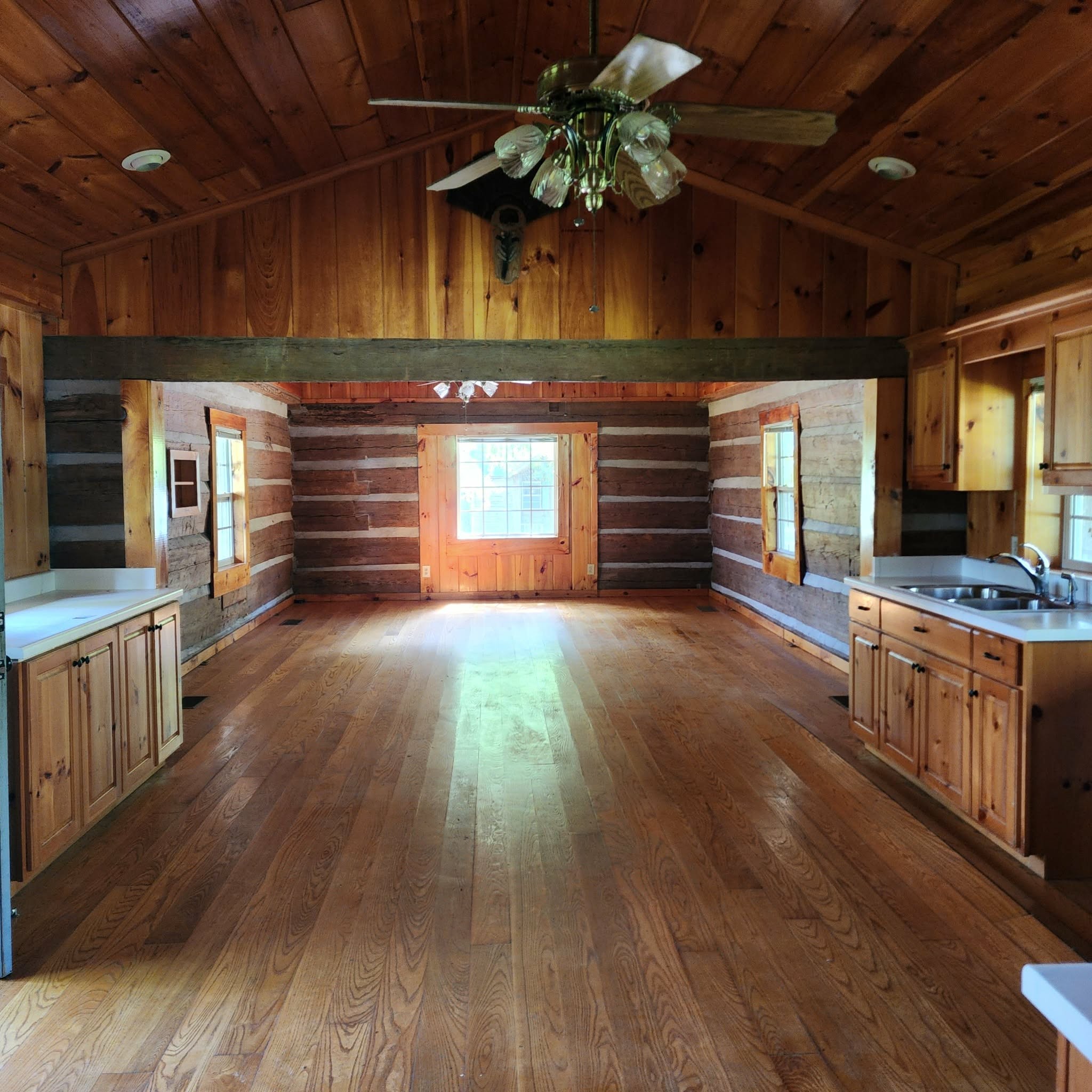 145 Mrs Gower Road Lawrenceburg, TN 38464 - Photo 7 of 26 a open kitchen with cabinets a counter and chairs