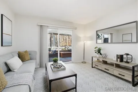 a living room with furniture and a couch